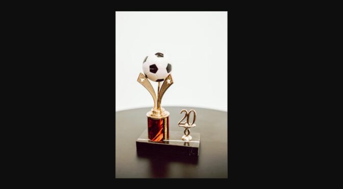 Golden soccer trophy symbolizing the World Cup third-place bronze medal