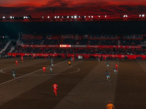 Football players competing on the pitch during a World Cup 2026 match